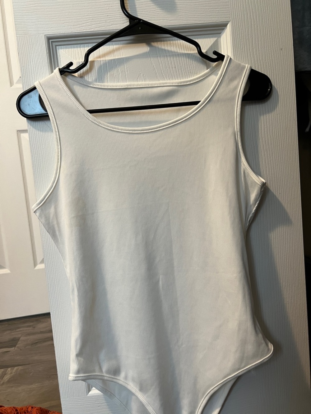 Sleeveless White Ribbed Women’s Bodysuit